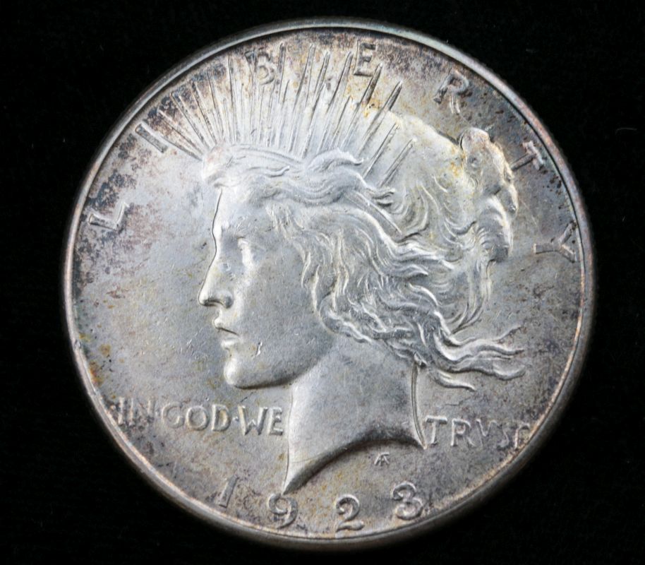 A 1923 S PEACE SILVER DOLLAR