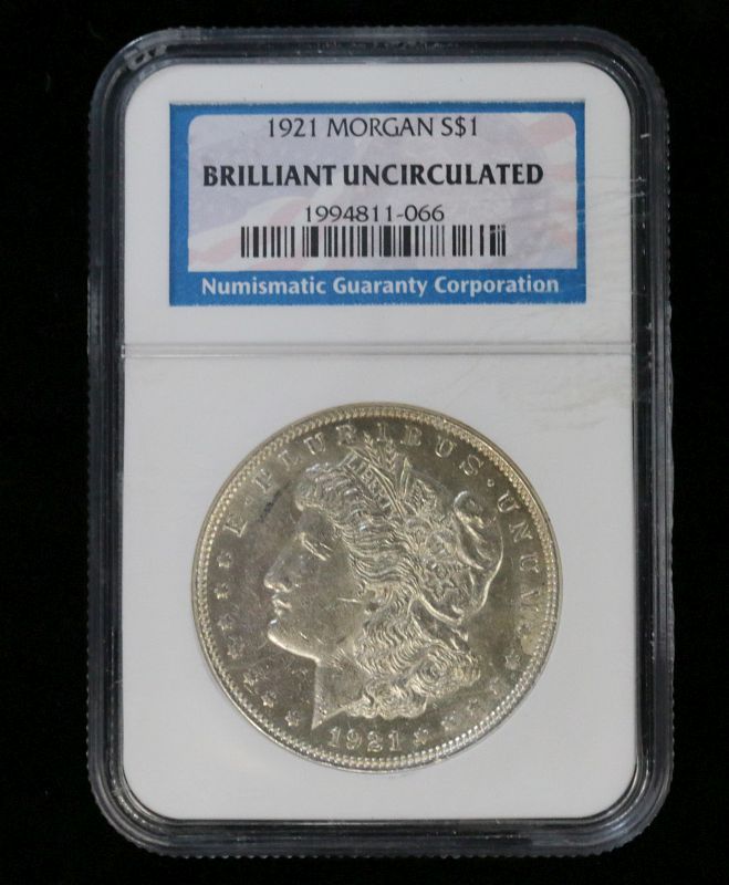 A 1921 MORGAN SILVER DOLLAR NGC BU