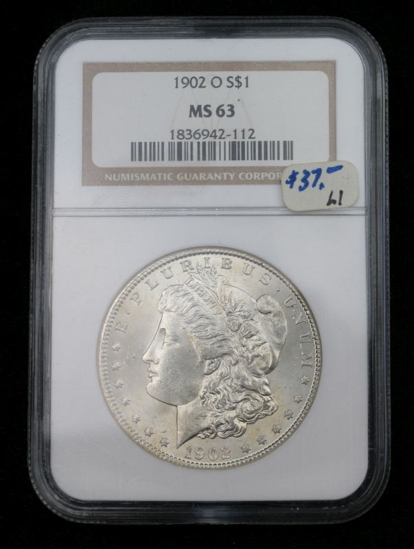 A 1902 MORGAN SILVER DOLLAR GRADED