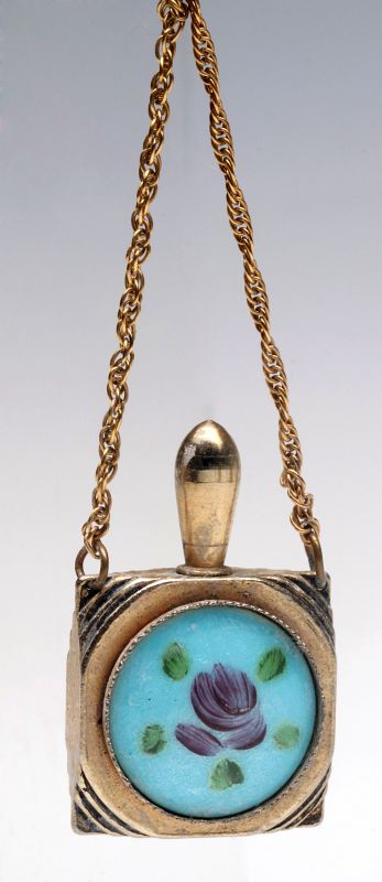 A VINTAGE ENAMELED PERFUME PENDANT