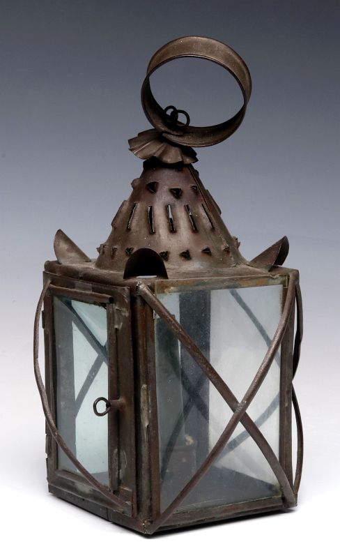 A 19TH CENTURY PIERCED TIN CANDLE LANTERN