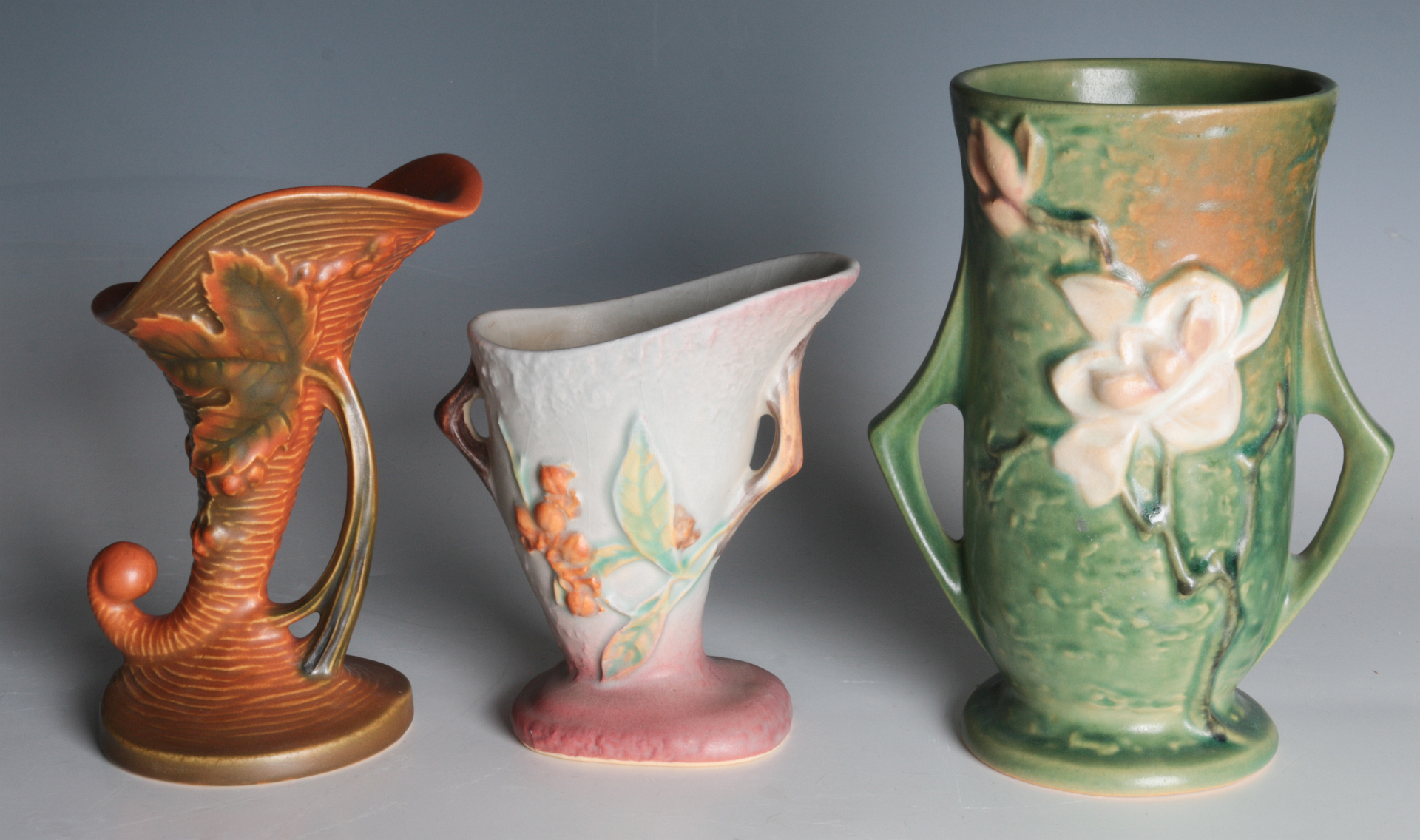 THREE ROSEVILLE ART POTTERY VASES