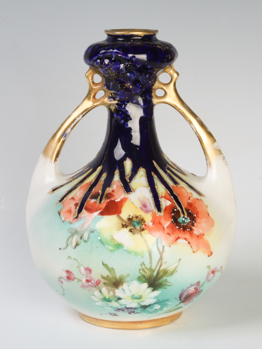 AN ORGANIC FORM STELLMACHER VASE WITH FLORALS