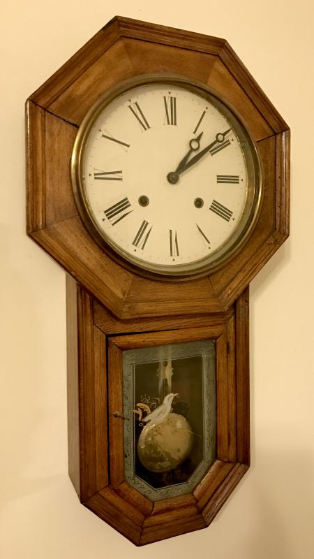 AN ANTIQUE OCTAGON DROP HANGING WALL CLOCK