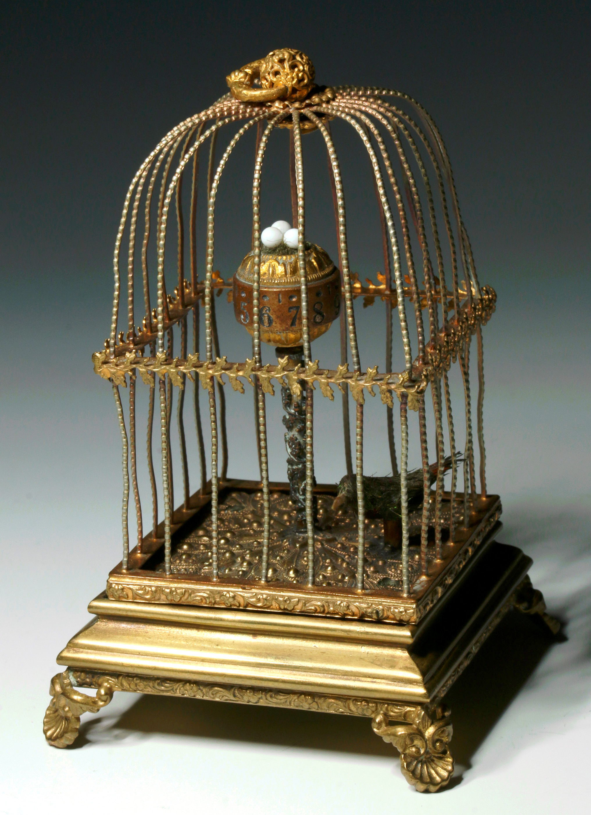 A CIRCA 1900 GERMAN AUTOMATON BIRD CAGE CLOCK