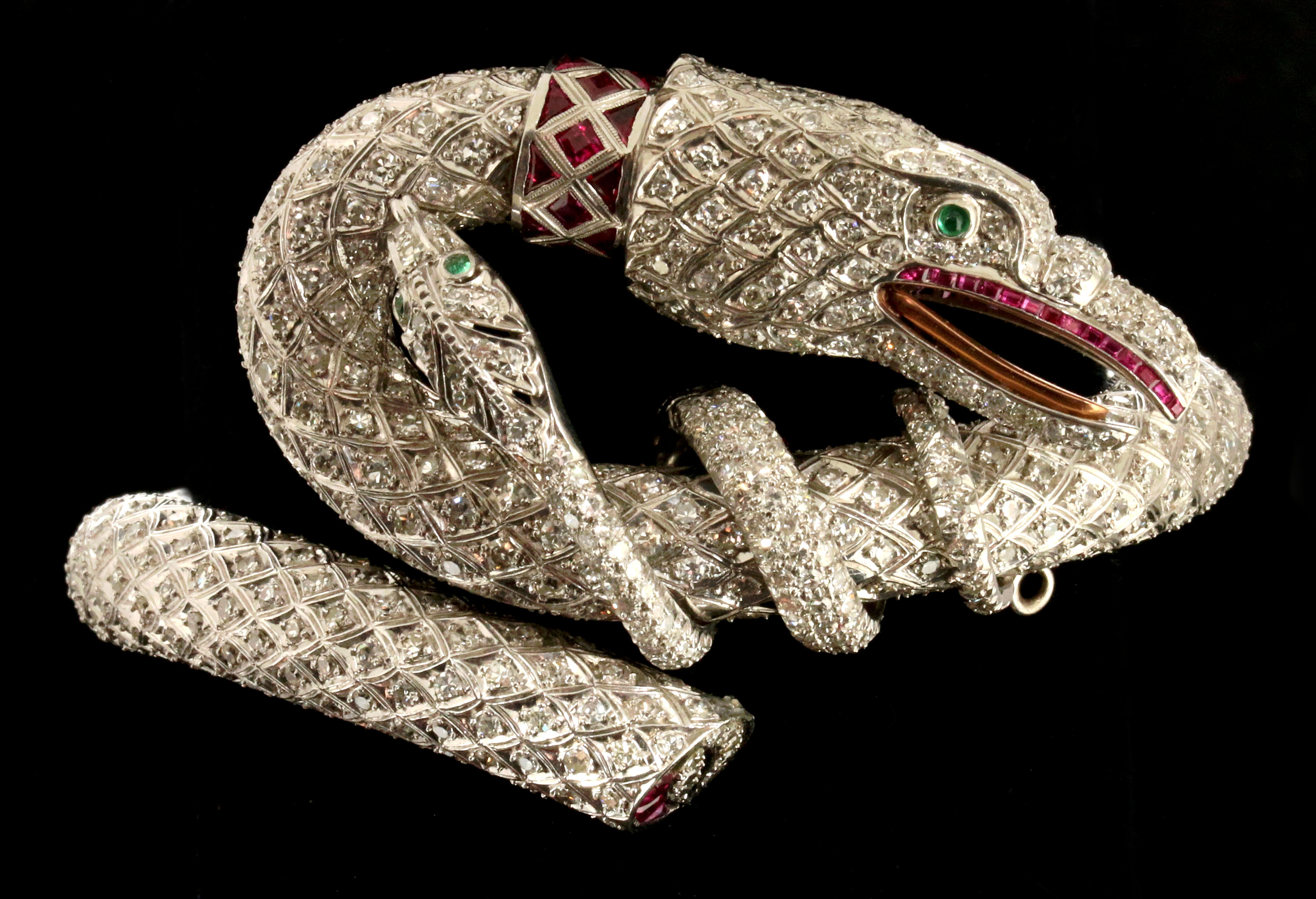 A FABULOUS DIAMOND AND RUBY PLATINUM 'SNAKE' BRACELET