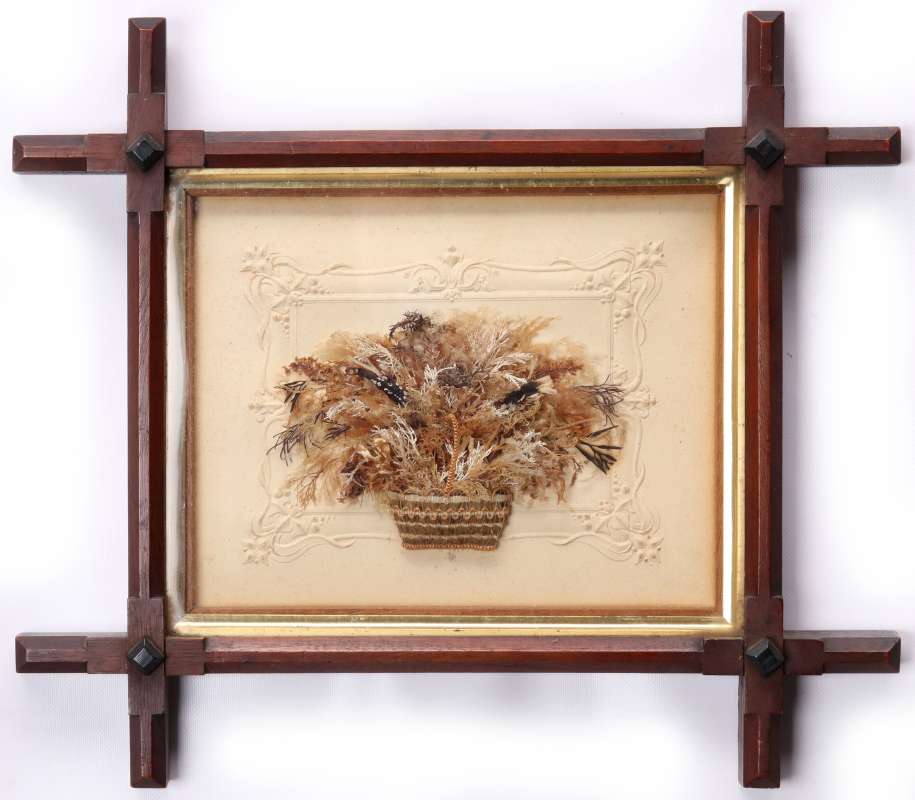 A 19THC. HERBARIUM FLOWER BASKET ON EMBOSSED PAPER