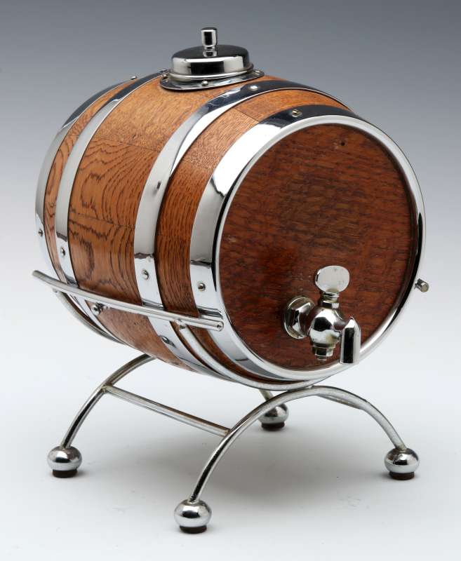 A MINIATURE OAK CASK ON STAND