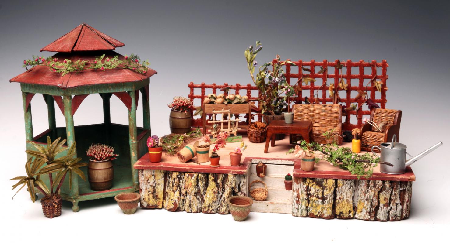 A GERMAN FLOWER GARDEN OPEN DIORAMA, CIRCA 1920s