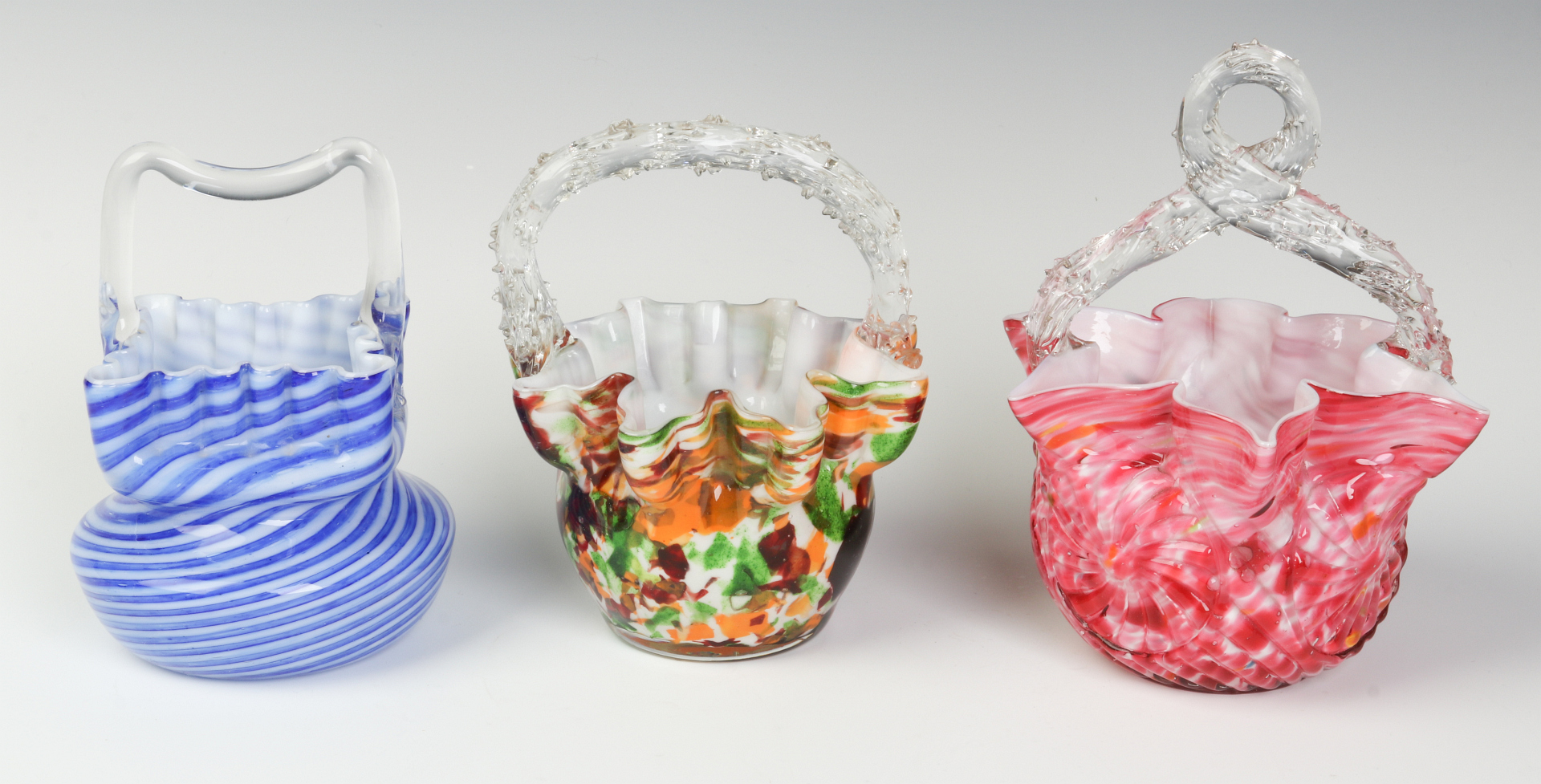 THREE VICTORIAN ART GLASS BASKETS