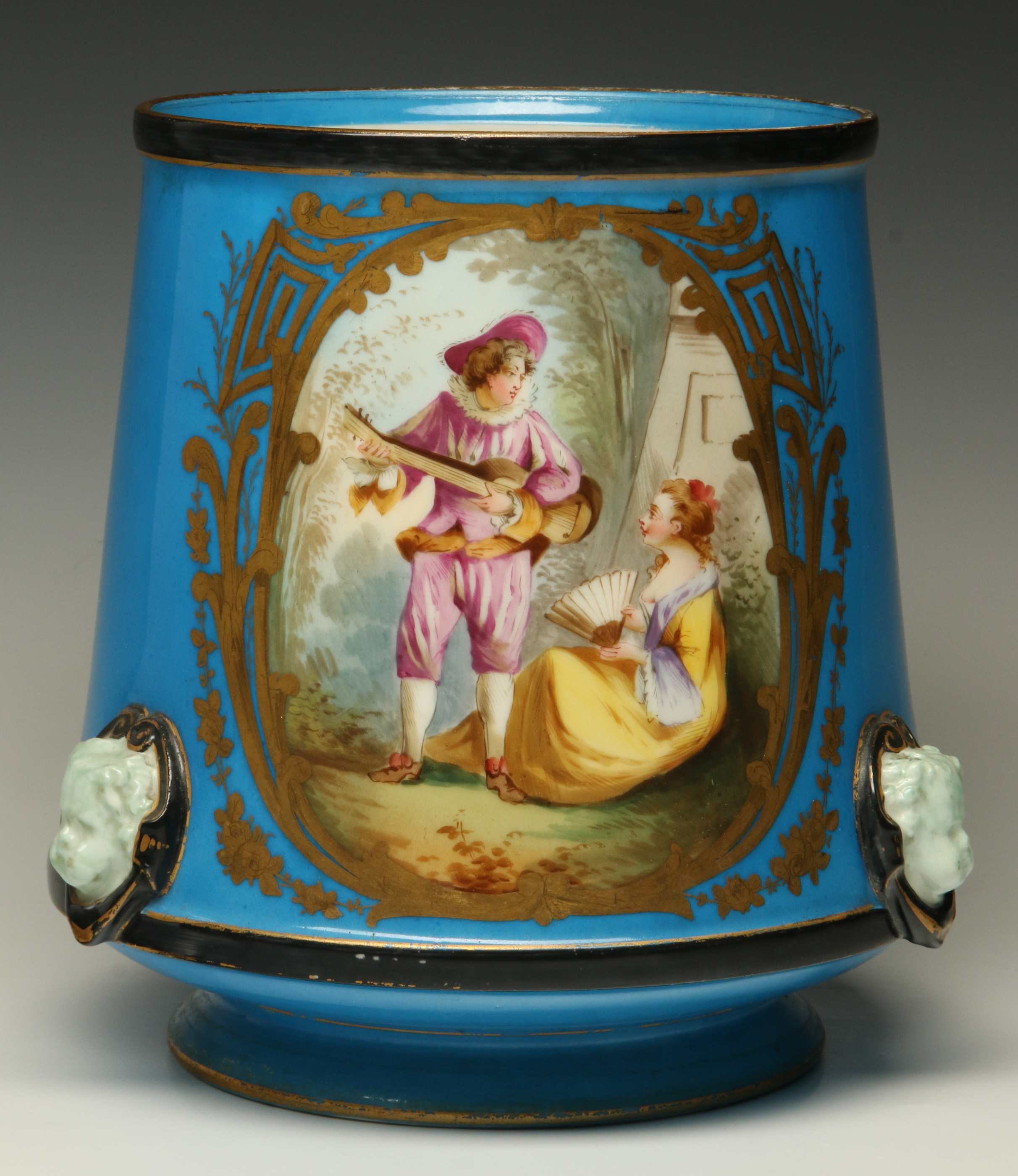 A 19TH CENTURY CONTINENTAL PORCELAIN JARDINIERE