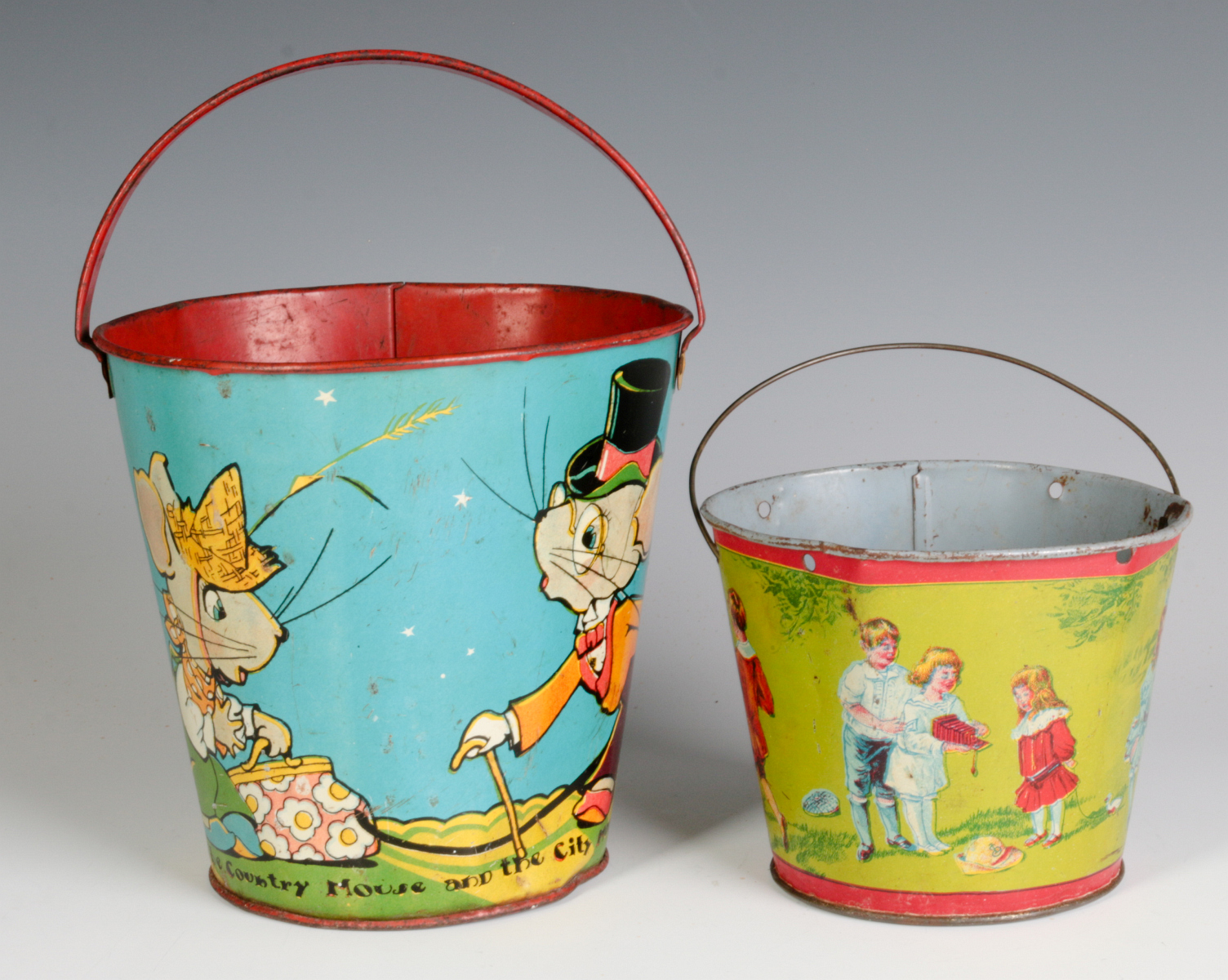 TWO TIN LITHO CHILD'S PAILS