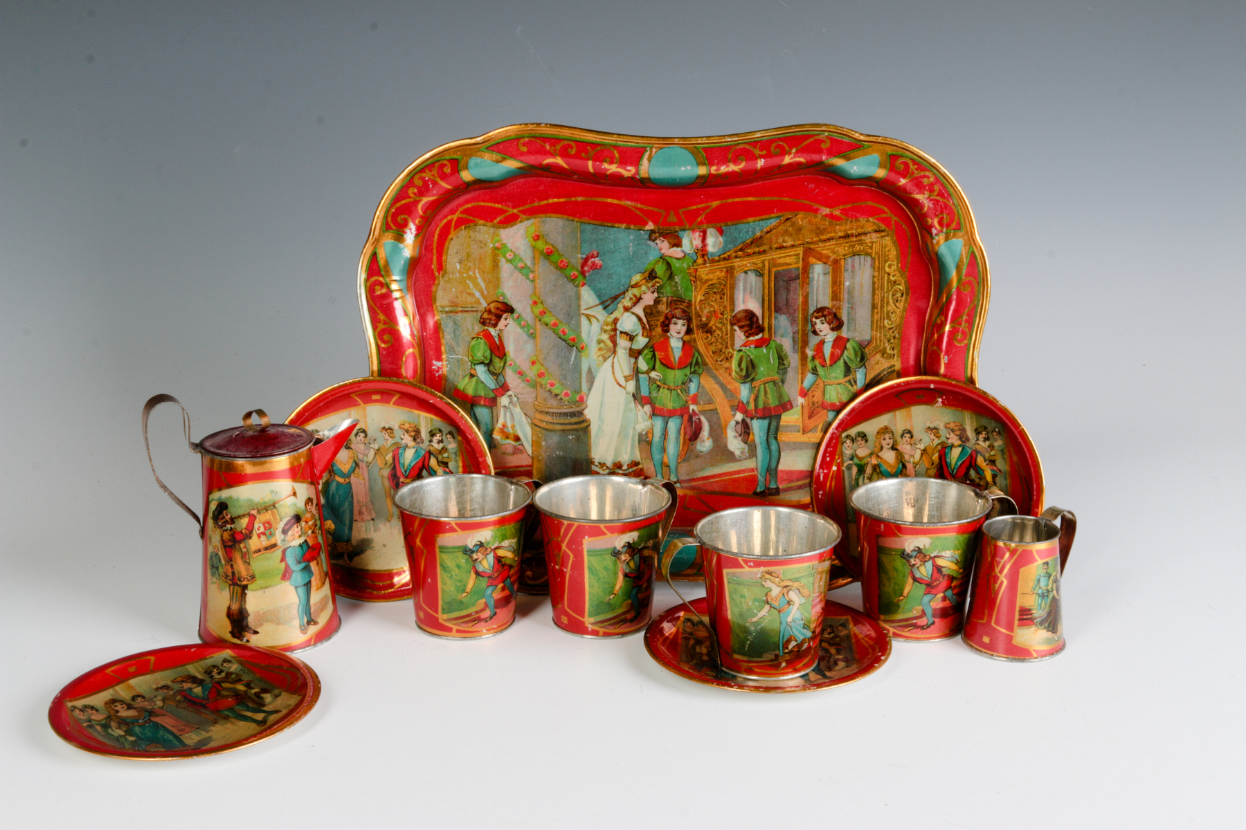 A NICE CINDERELLA THEME TIN LITHO CHILD'S TEA SET