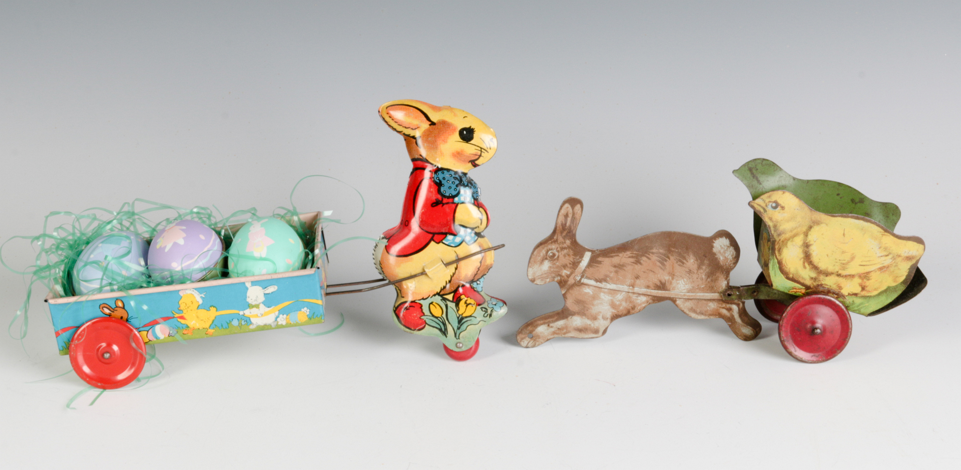 CIRCA 1910 AND 1950 TIN LITHO EASTER TOYS
