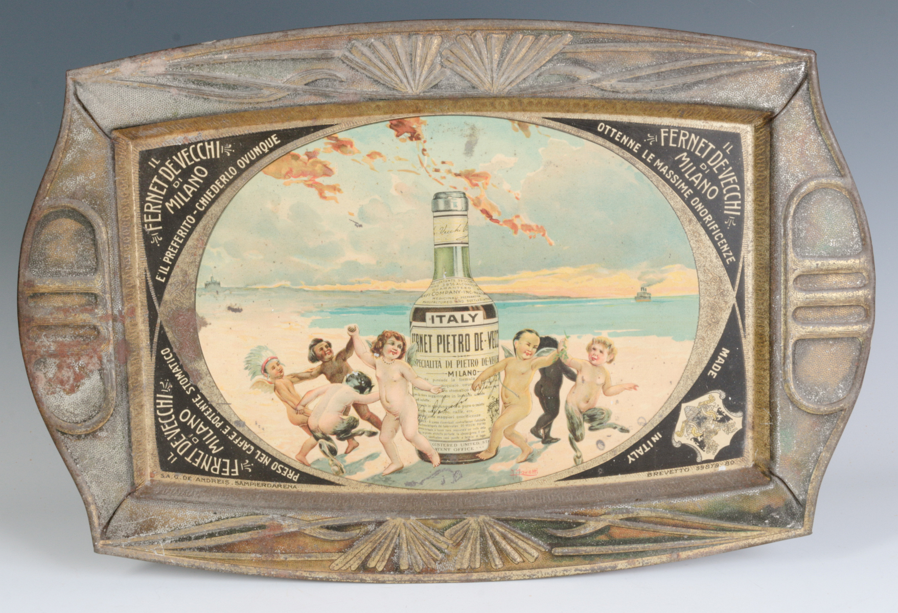 A TIN TRAY ADVERTISING AN ITALIAN LIQUEUR C. 1910