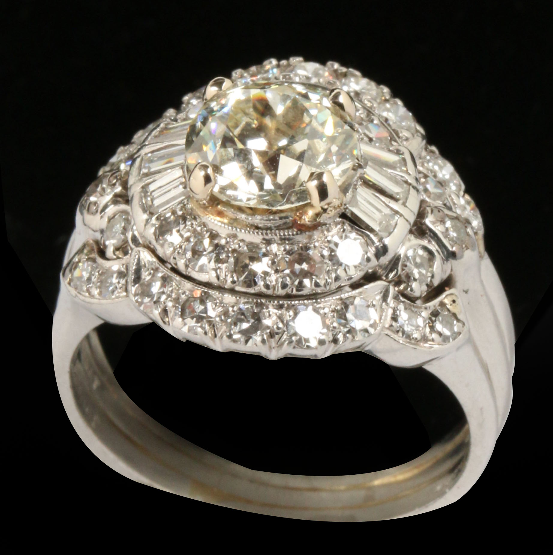 A 1.4 CARAT DIAMOND AND PLATINUM ENGAGEMENT RING