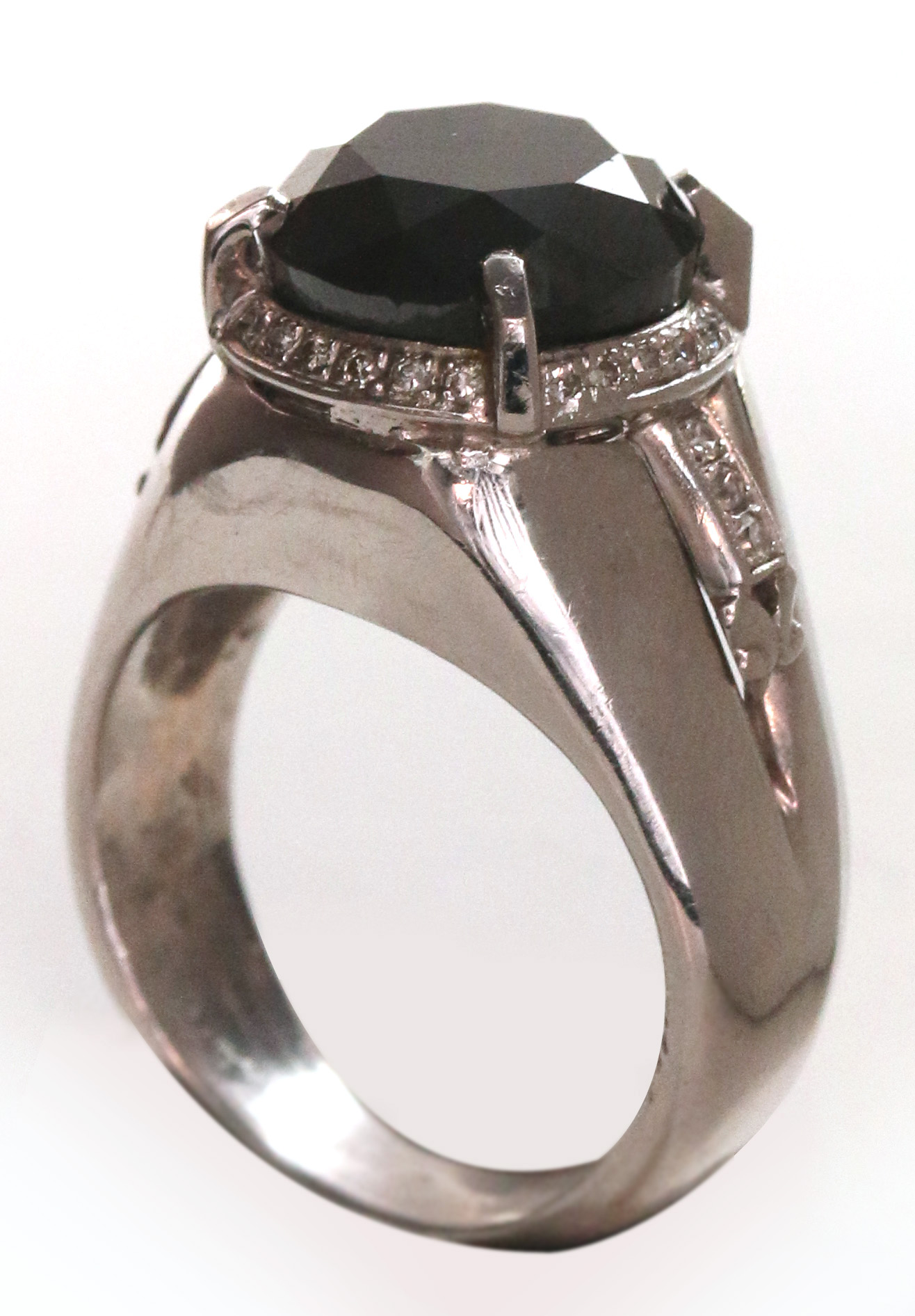 A GENT'S 14K RING WITH 8 CARAT BLACK DIAMOND