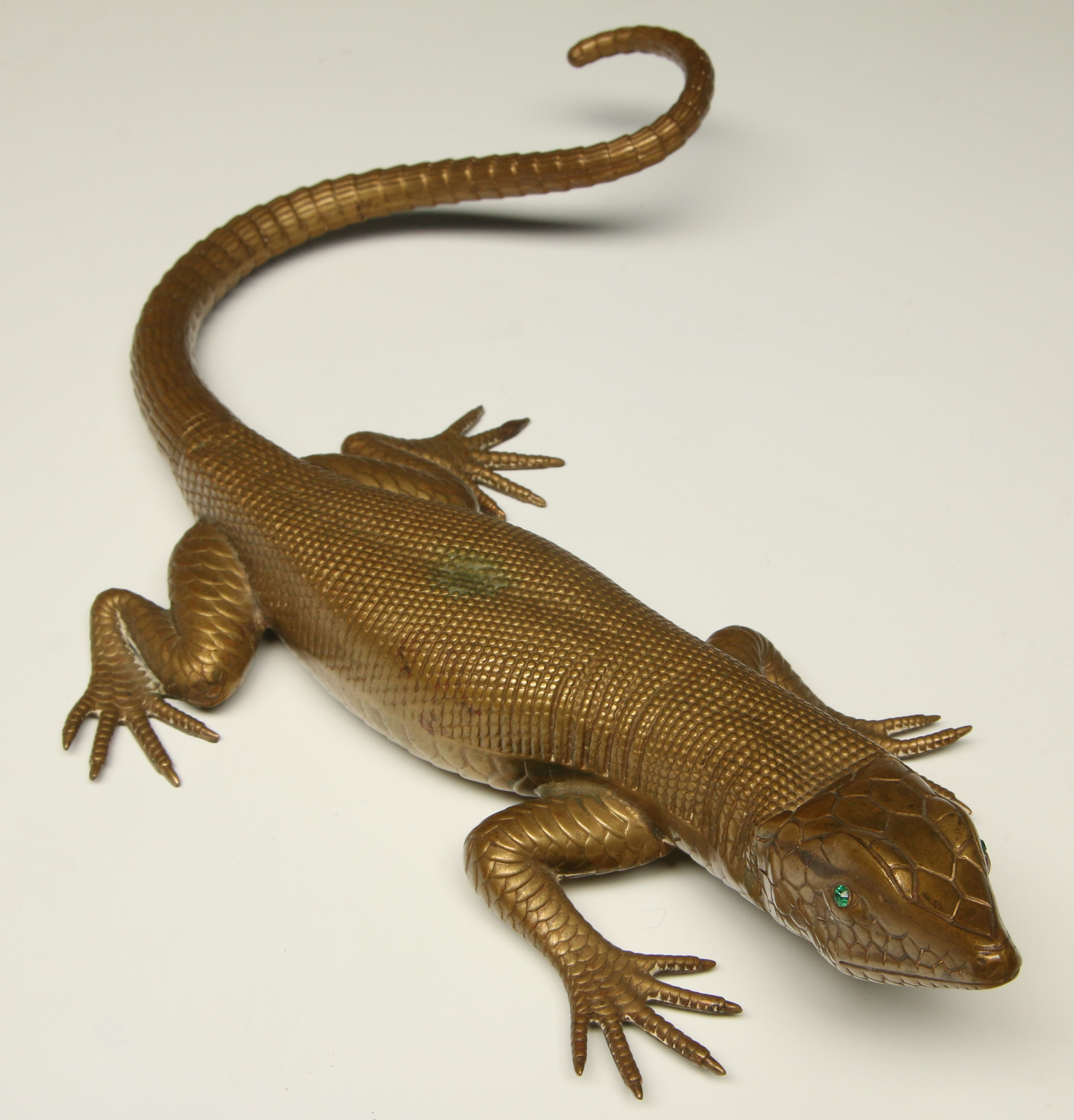 A FRENCH OR AUSTRIAN BRONZE LIZARD WITH GEMSTONE E