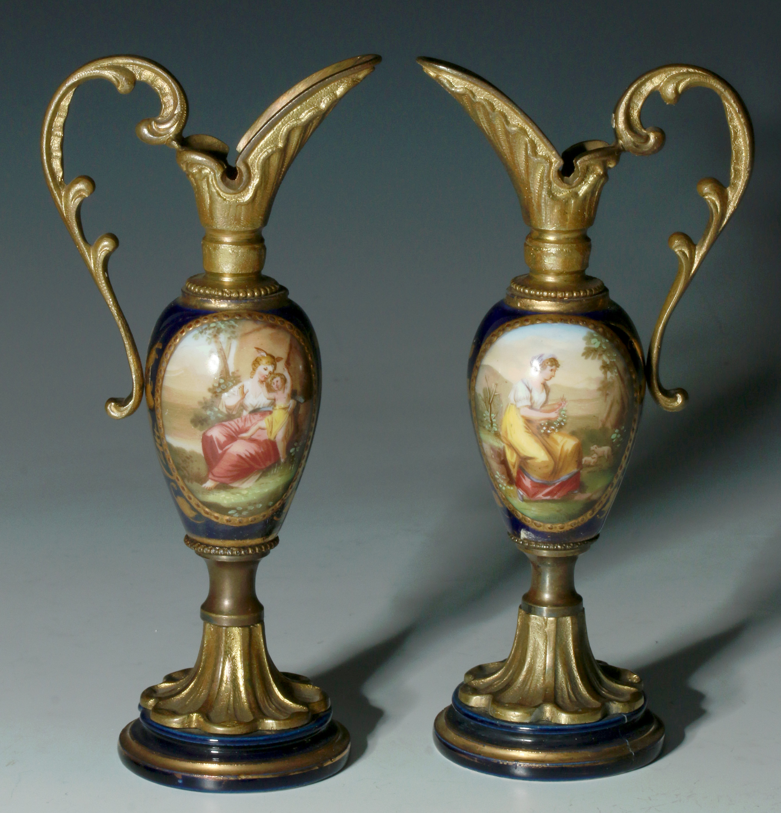 A PAIR CONTINENTAL BRONZE & PORCELAIN MINIATURE EW