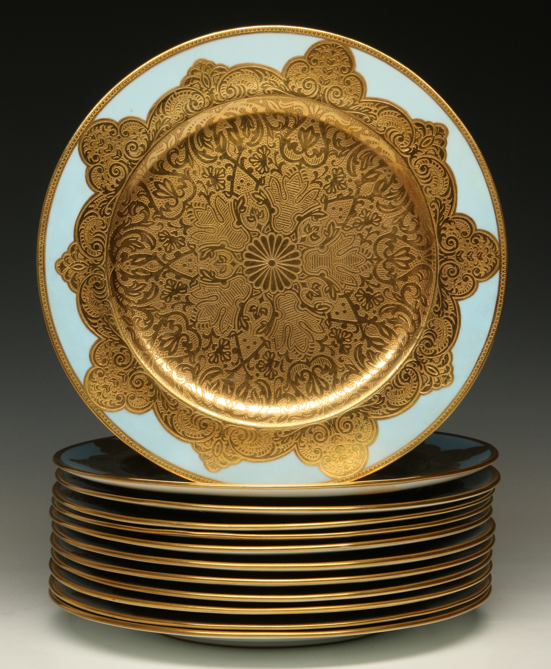 TWELVE HEAVY GOLD EMBOSSED PORCELAIN SERVICE PLATE