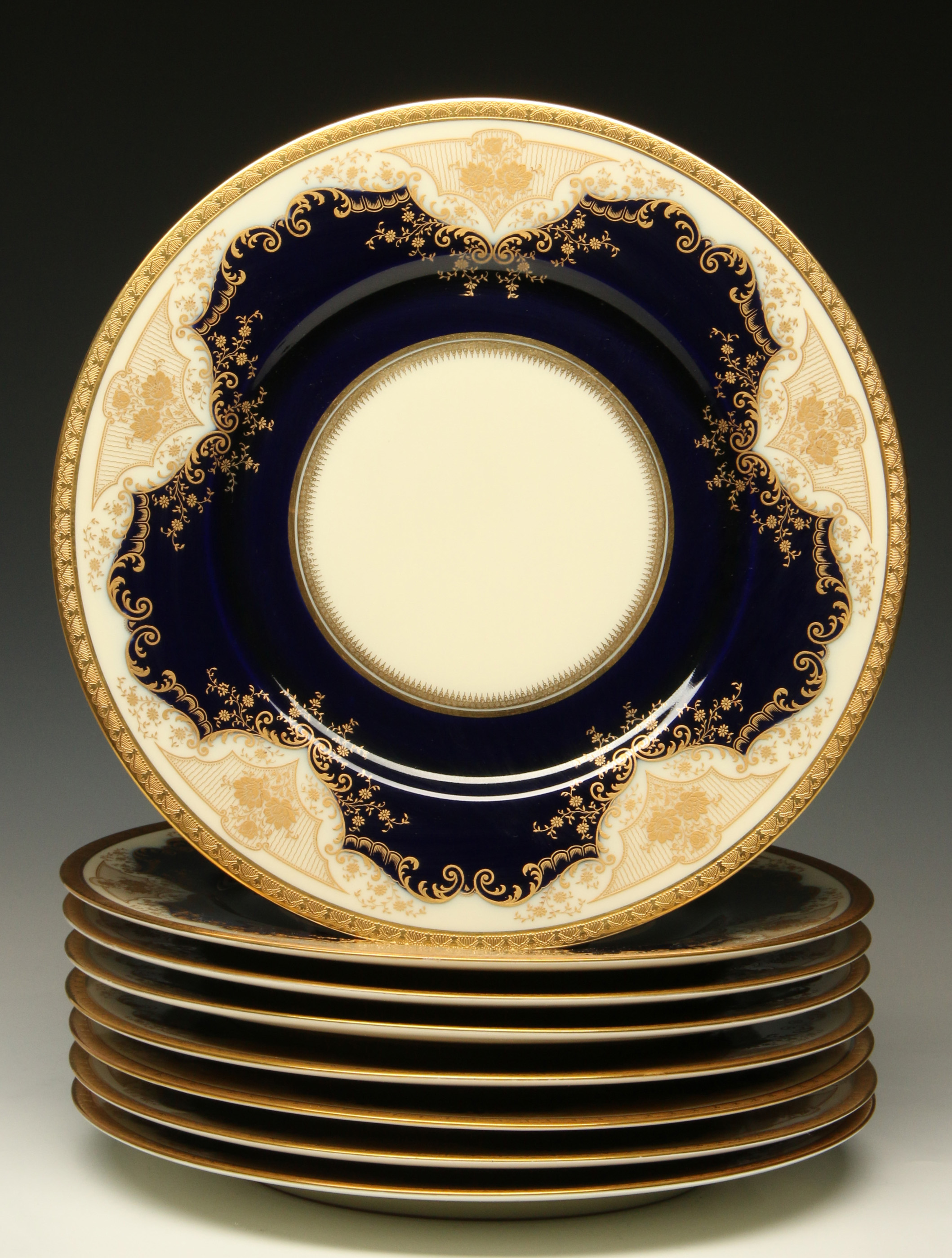 A SET OF EIGHT BLACK KNIGHT CHINA SERVICE PLATES