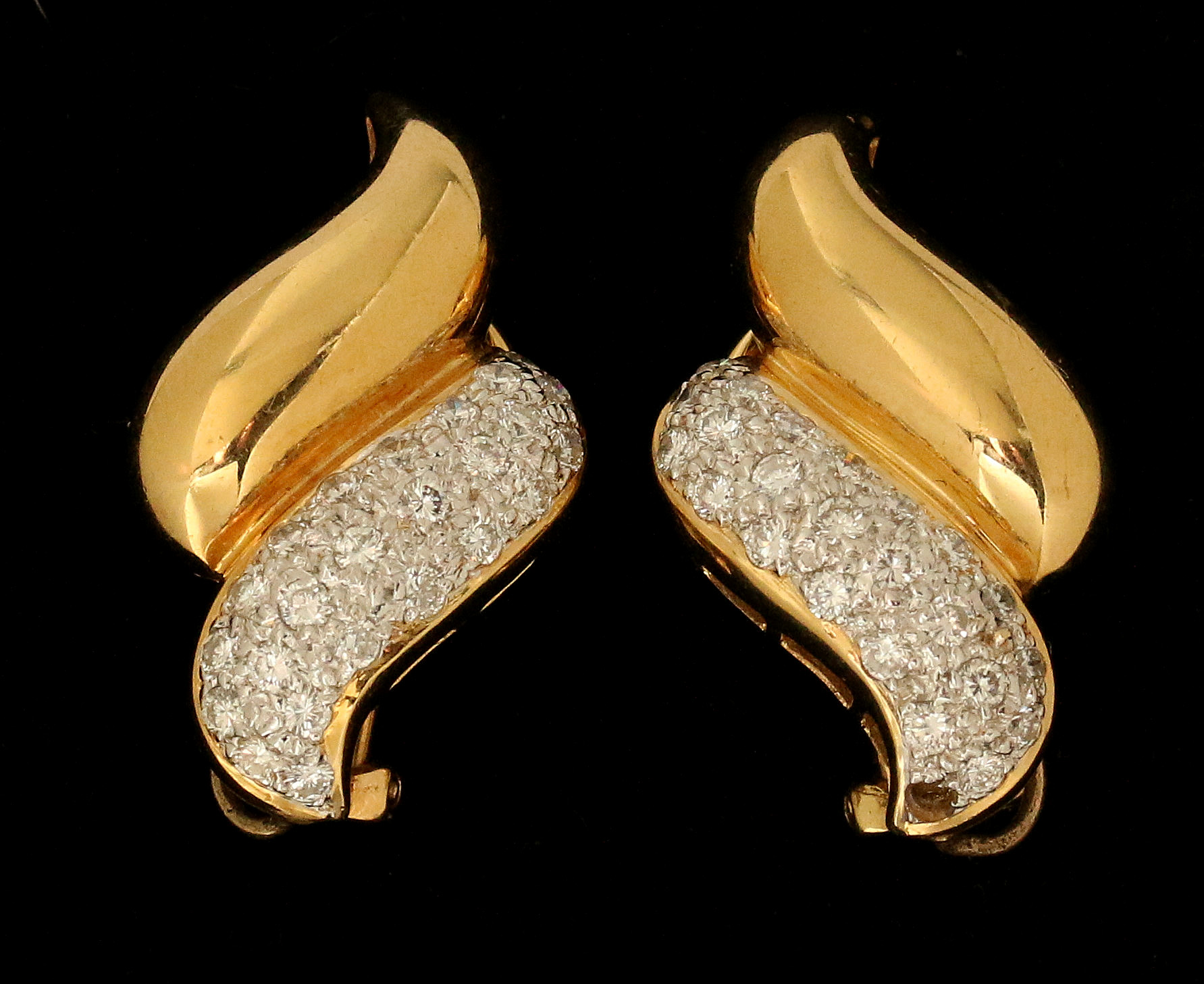 A PAIR 18K PAVE SET 1.2 CARAT TW DIAMOND EARRINGS