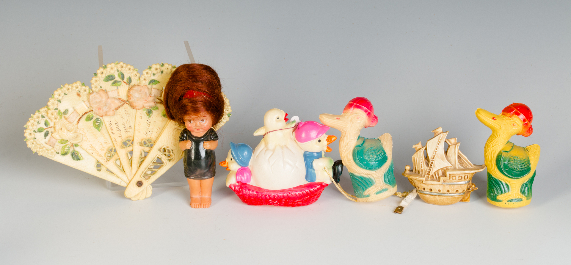 A COLLECTION OF VINTAGE CELLULOID TOYS