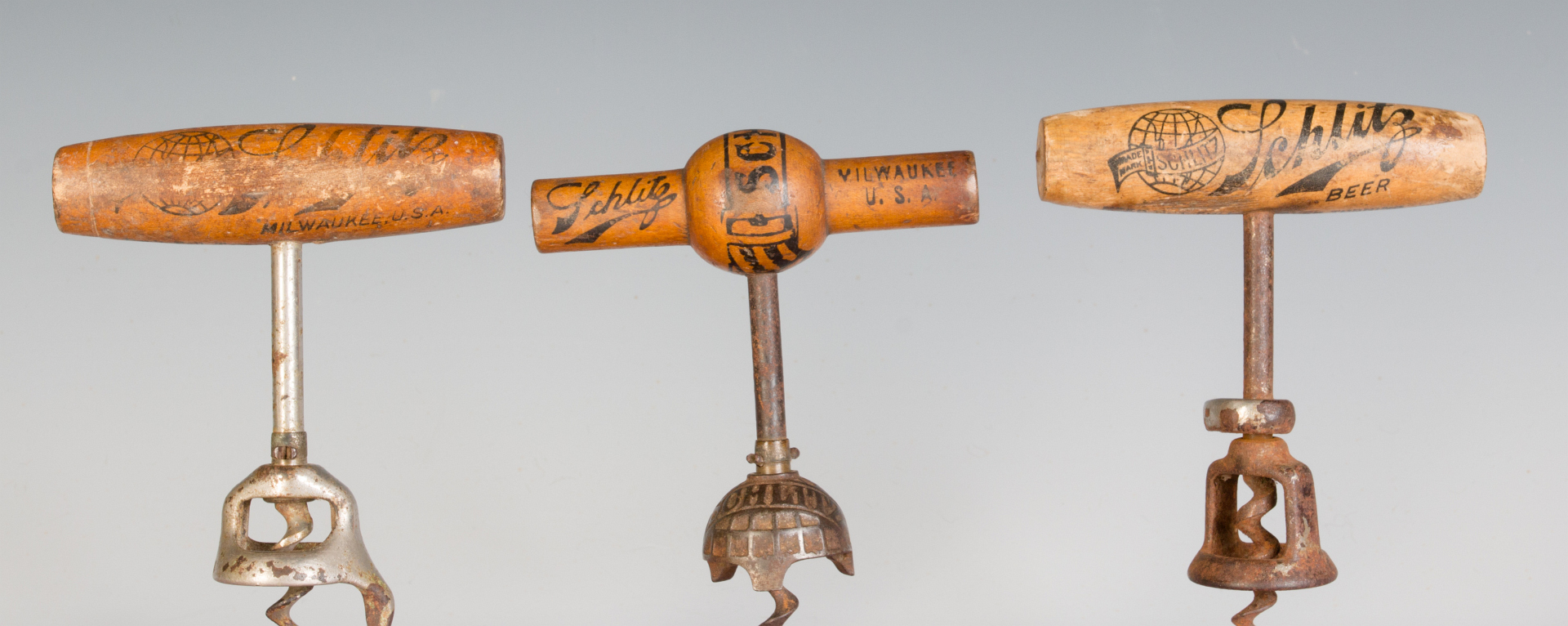 THREE SCHLITZ BEER ADVERTISING CORKSCREWS