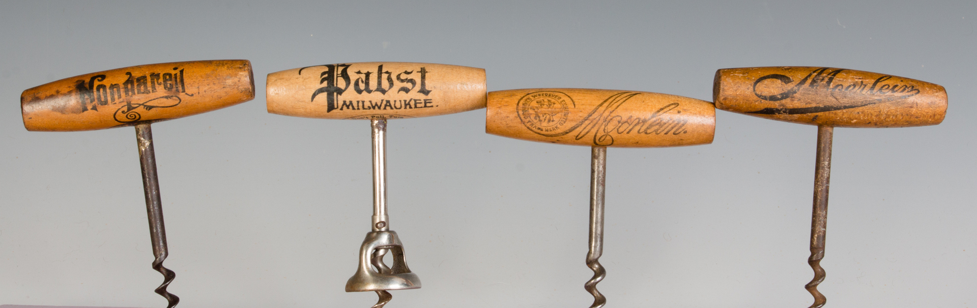 COLLECTION OF VINTAGE BEER ADVERTISING CORKSCREWS