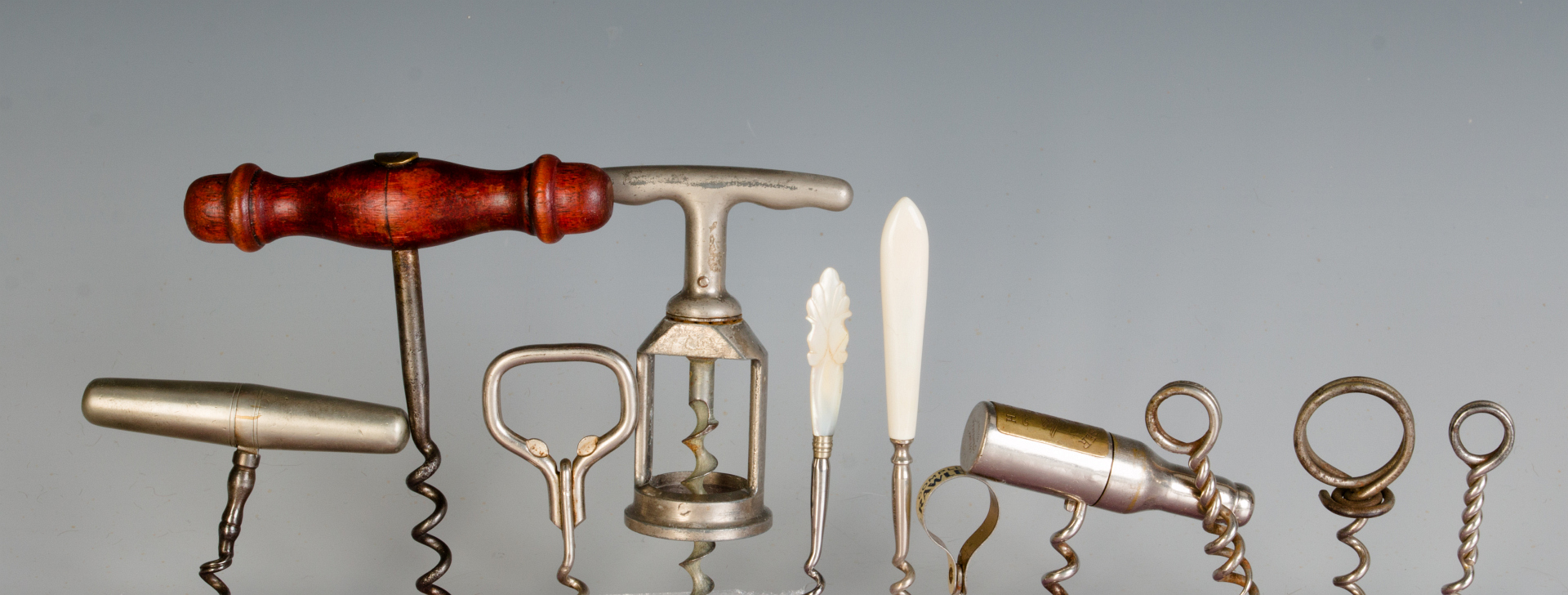 A COLLECTION OF VINTAGE CORKSCREWS