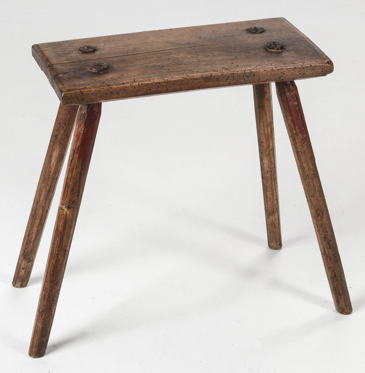 A PRIMITIVE LATE 18TH CENTURY CRICKET STOOL