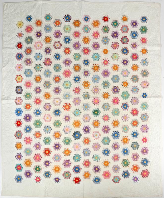 A 'GRANDMOTHER'S FLOWER GARDEN' MICRO PIECE QUILT