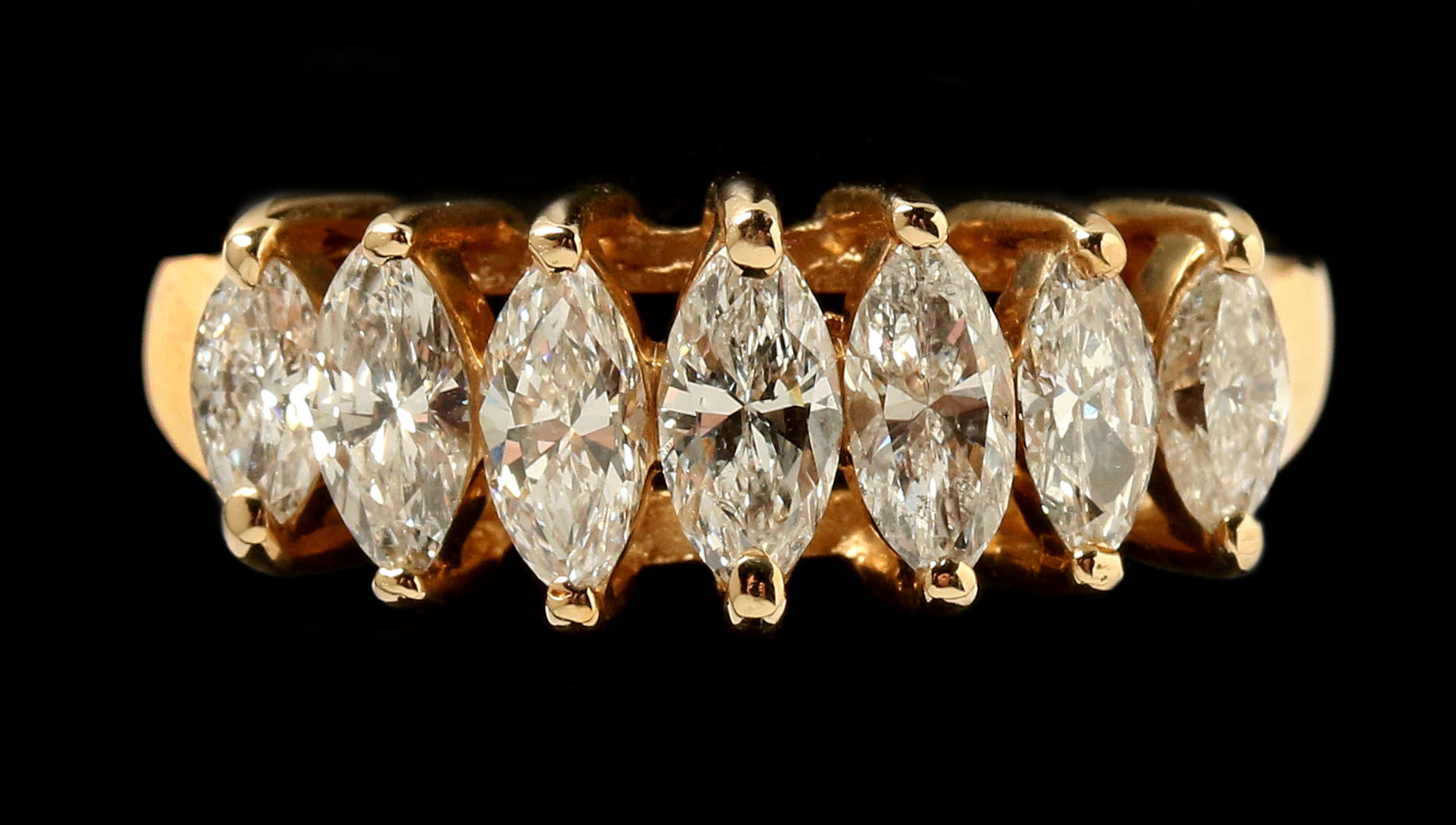 A 14K YELLOW GOLD MARQUISE DIAMOND BAND