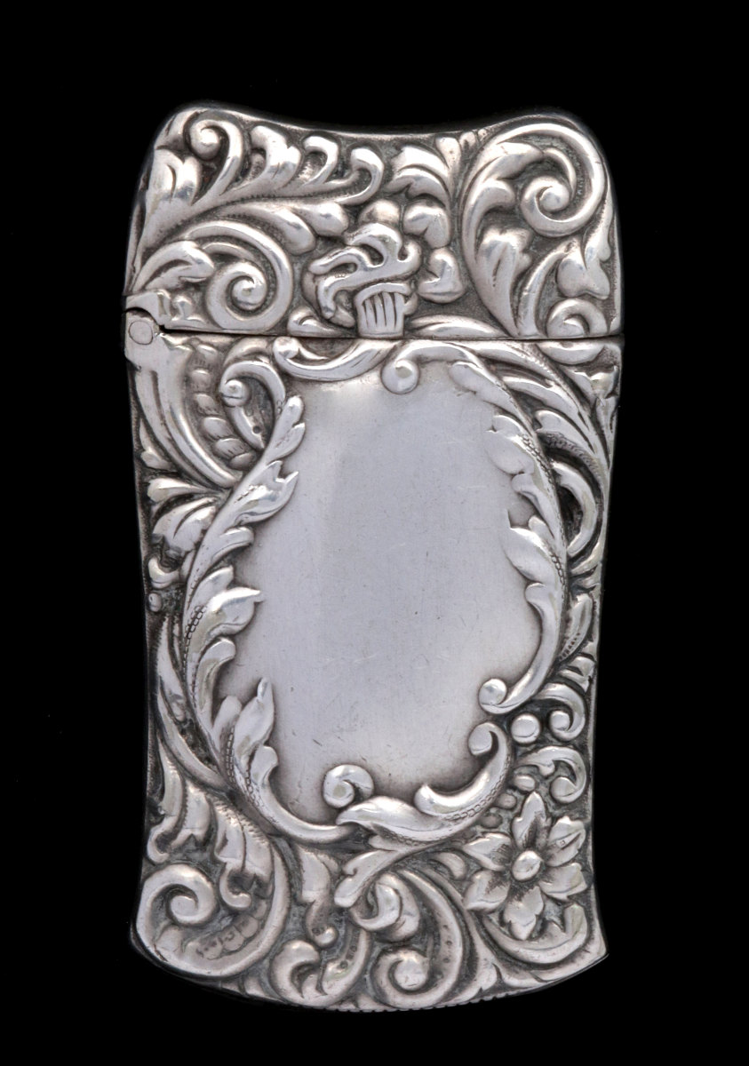 AN ANTIQUE STERLING SILVER MATCH SAFE