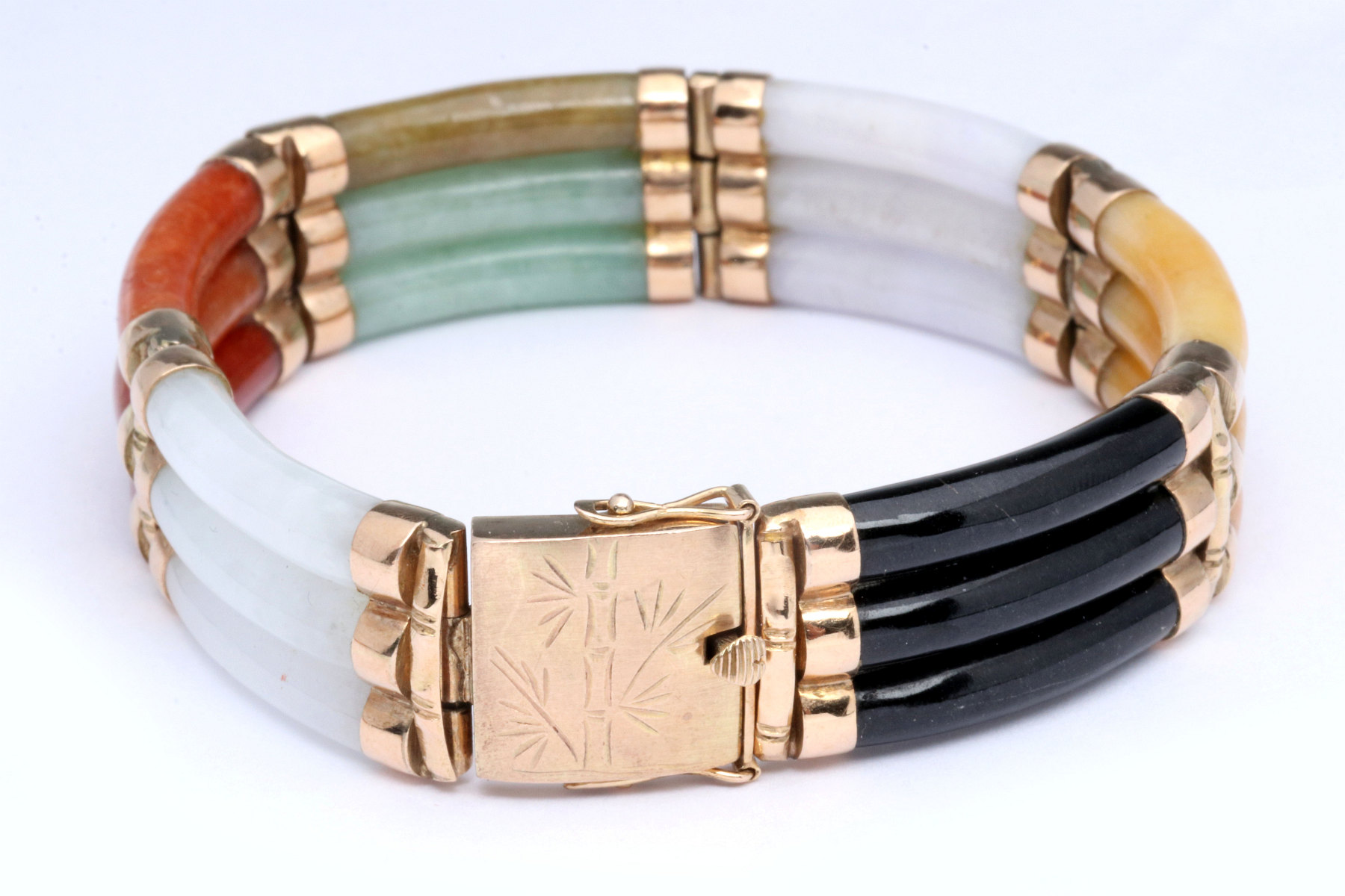 A 14K GOLD AND SEMIPRECIOUS THREE BAND BRACELET