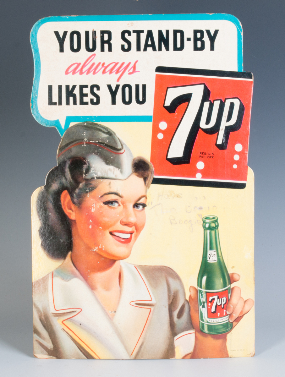 A WORLD WAR II DIE-CUT EASEL BACK 7-UP SIGN