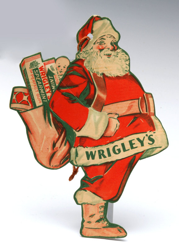 A WRIGLEY'S GUM DIE-CUT SANTA CLAUS ORNAMENT