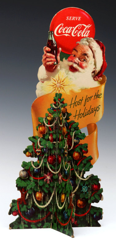 A VINTAGE COCA-COLA DIE-CUT DISPLAY WITH SANTA