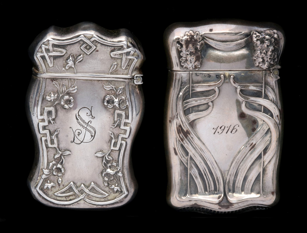 TWO ANTIQUE STERLING SILVER MATCH SAFES