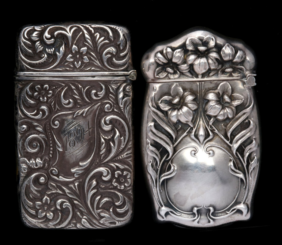 TWO ANTIQUE STERLING SILVER MATCH SAFES