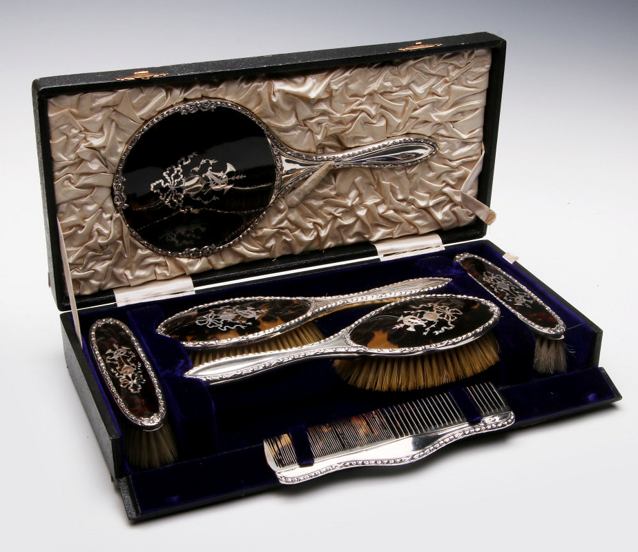 A FINE LONDON STERLING, FAUX TORTOISE DRESSER SET