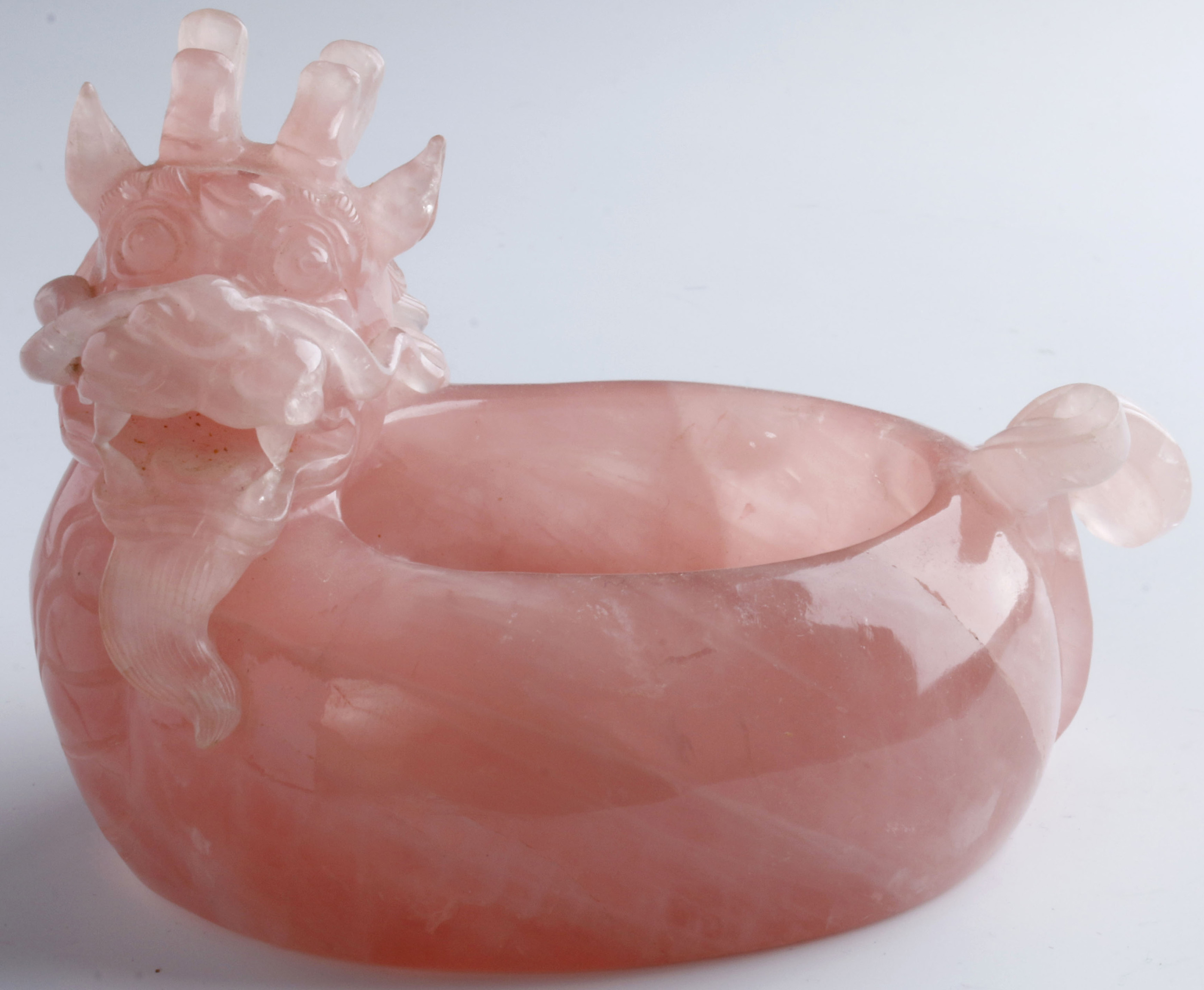 A CHINESE CARVED ROSE QUARTZ DRAGON BOWL