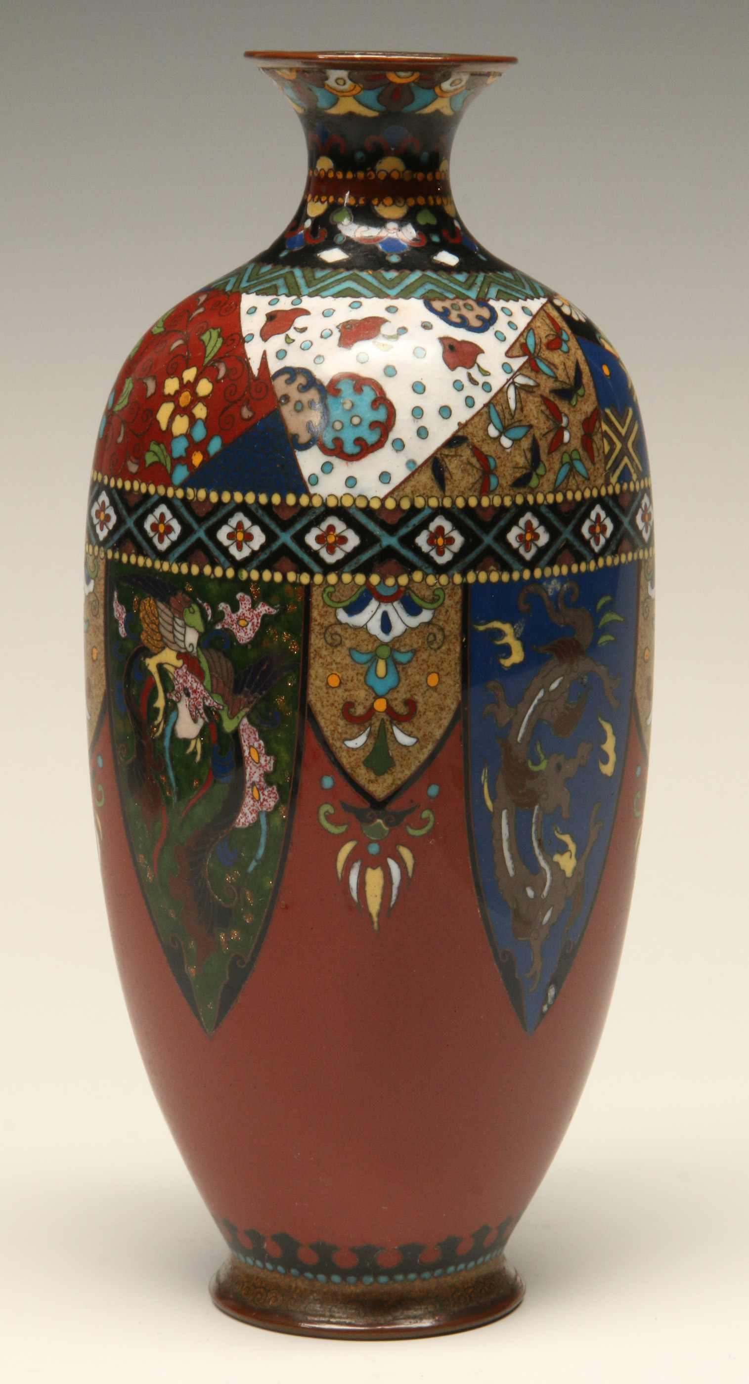 A RED GROUND ANTIQUE CLOISONNE ENAMEL VASE