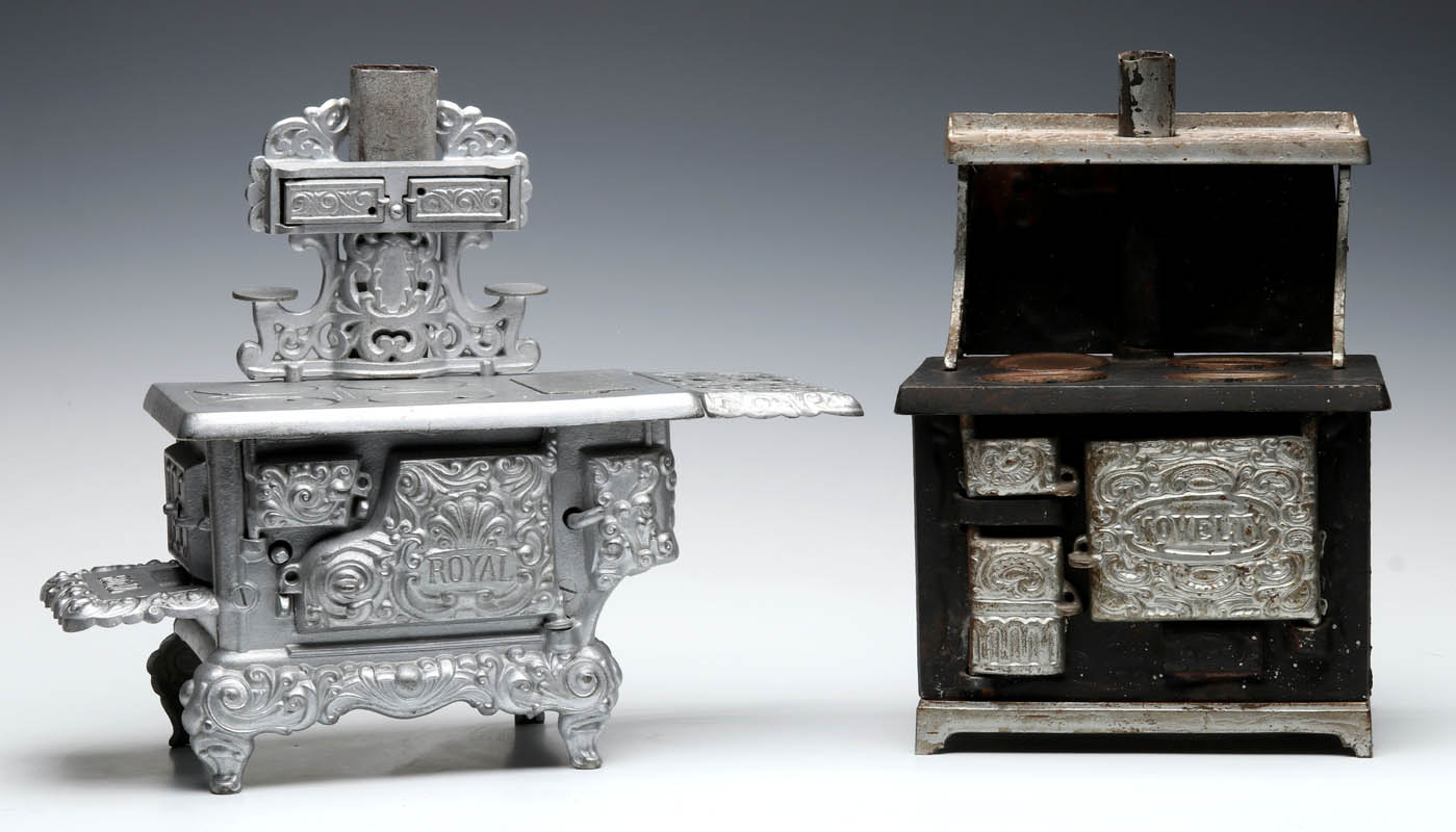 TWO ANTIQUE KENTON CAST IRON TOY STOVES