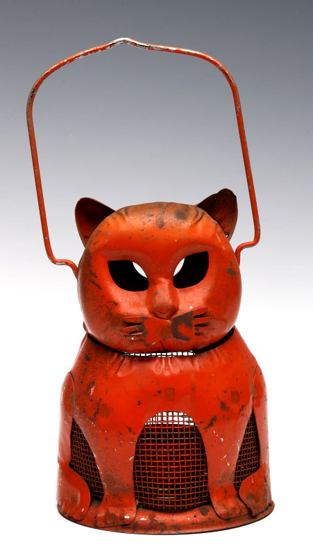 A VERY UNUSUAL ORANGE TIN CAT HALLOWEEN LANTERN