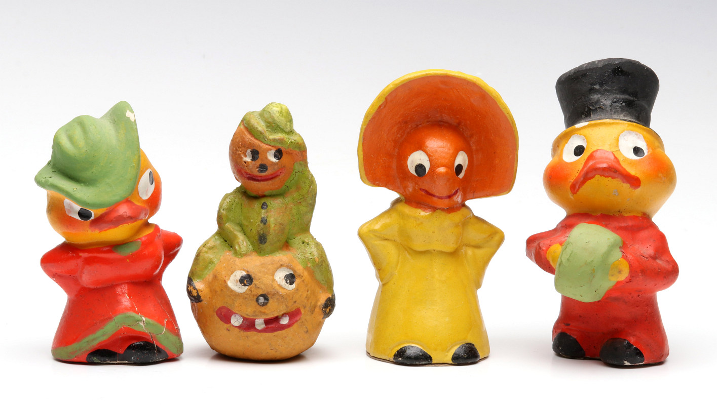 FOUR GERMAN PLASTER NOVELTY FIGURES