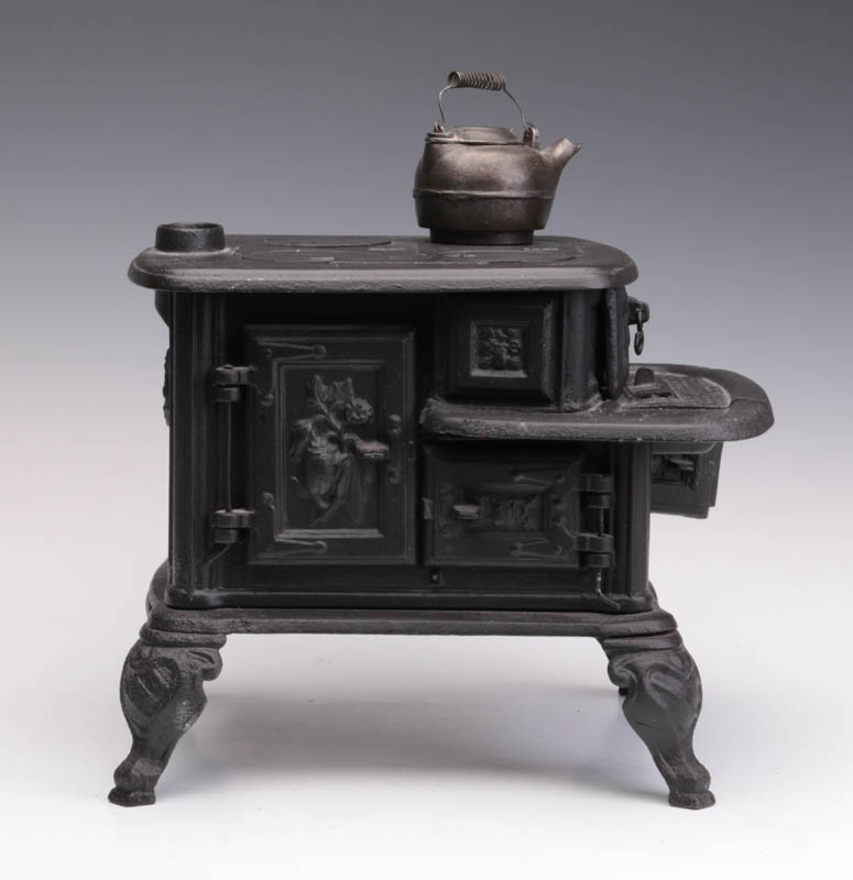 AN ABENDROTH BROS. 'COTTON PLANT' MINIATURE STOVE