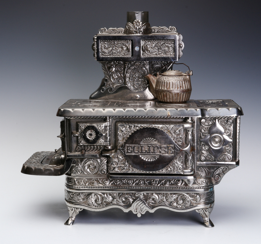 A J&E STEVENS 'ECLIPSE' CAST IRON TOY STOVE