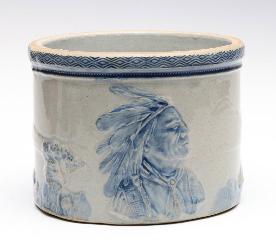 AN OLD SLEEPY EYE BLUE AND GREY BUTTER CROCK