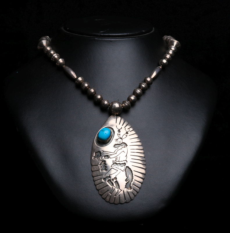 LARRY BILL TOM (20TH C.) NAVAJO STERLING PENDANT